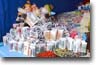 Ekekos y billetes en miniatura
